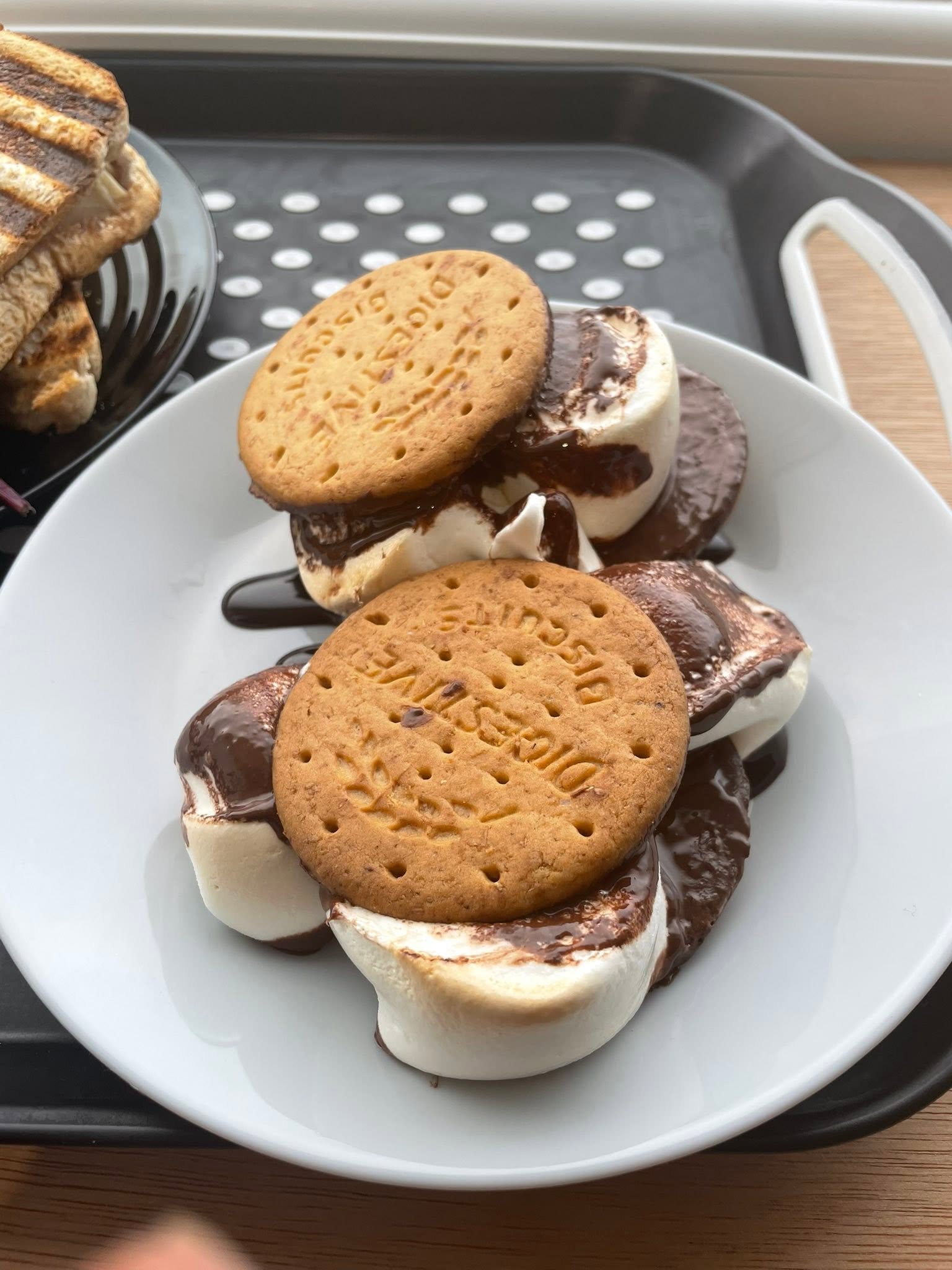 S'mores with digestive biscuits and toasted marshmallow