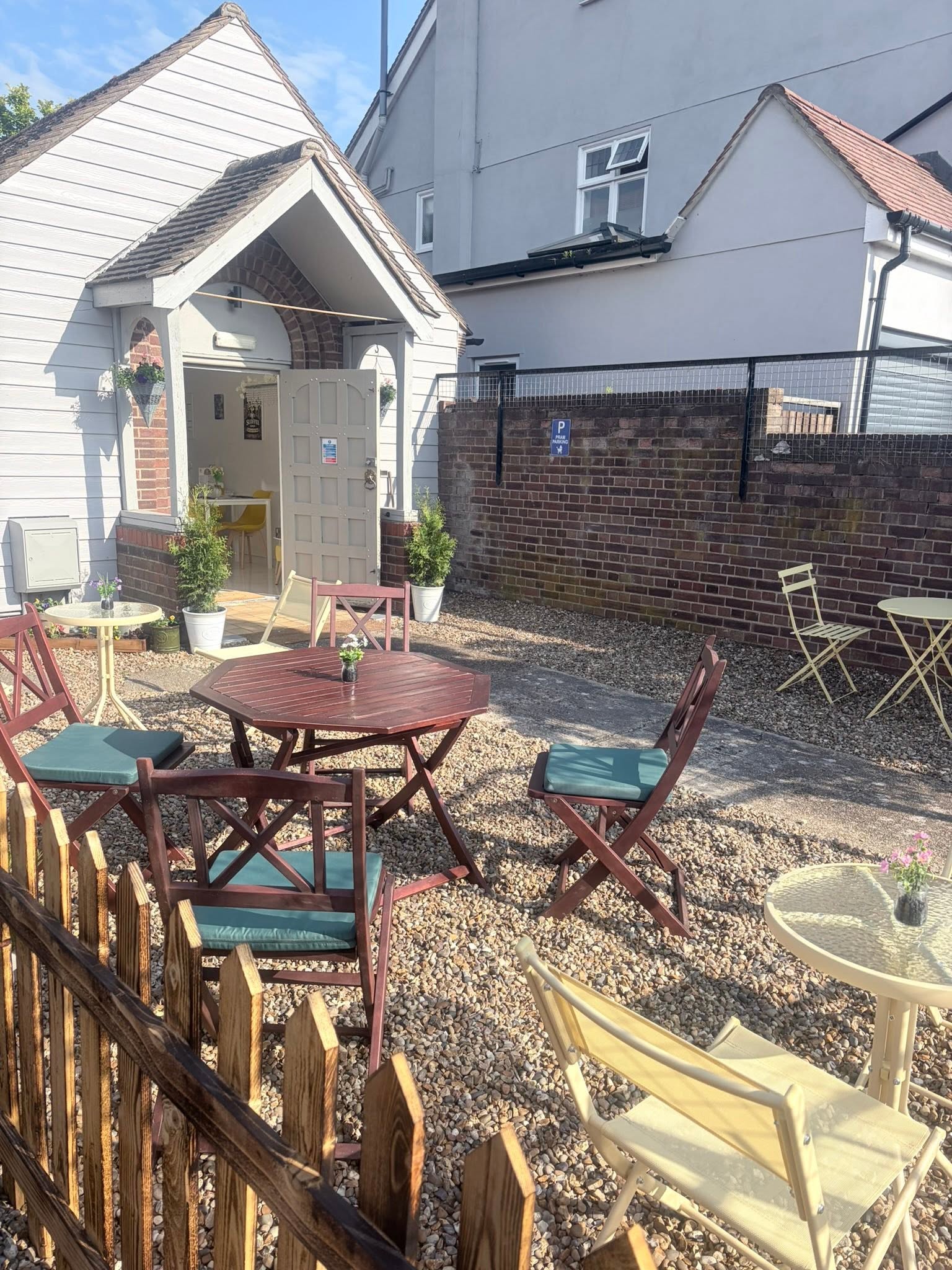 Outdoor garden seating at The Sloffee Shop